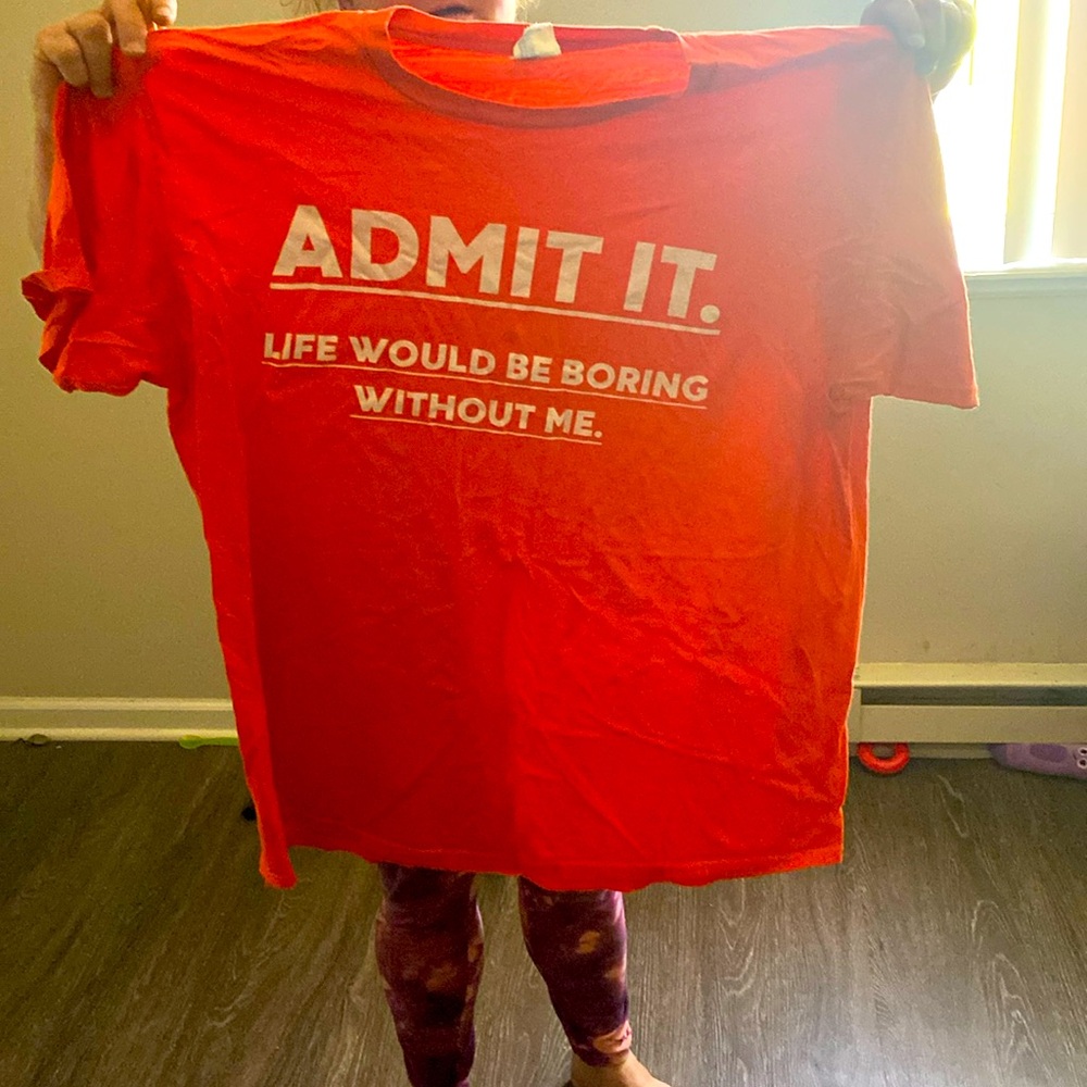 Orange T-shirt that says life would be boring without me